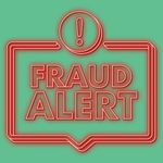 a red sign with a exclamation mark that says Fraud Alert